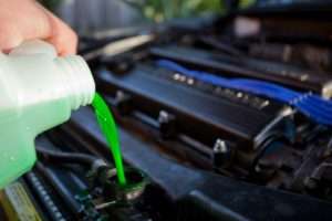 adding coolant to lifted truck